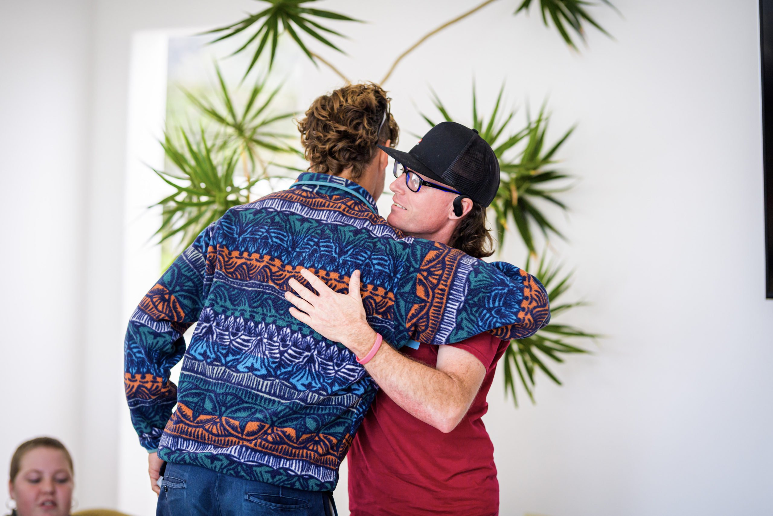 Shane and another Forge attendee hugging.