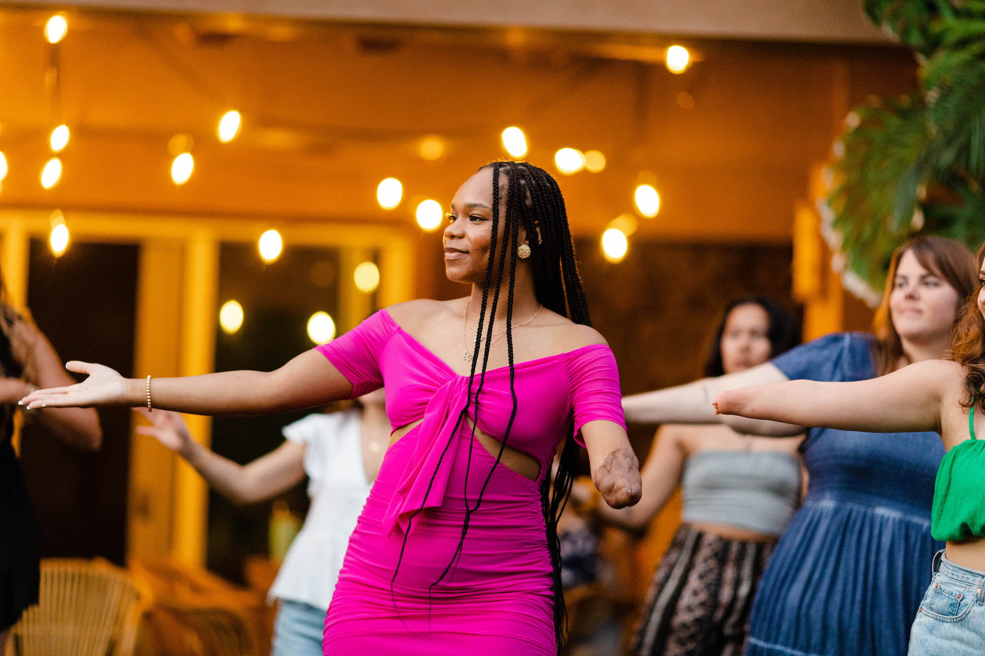 Retreat attendee dancing the hula