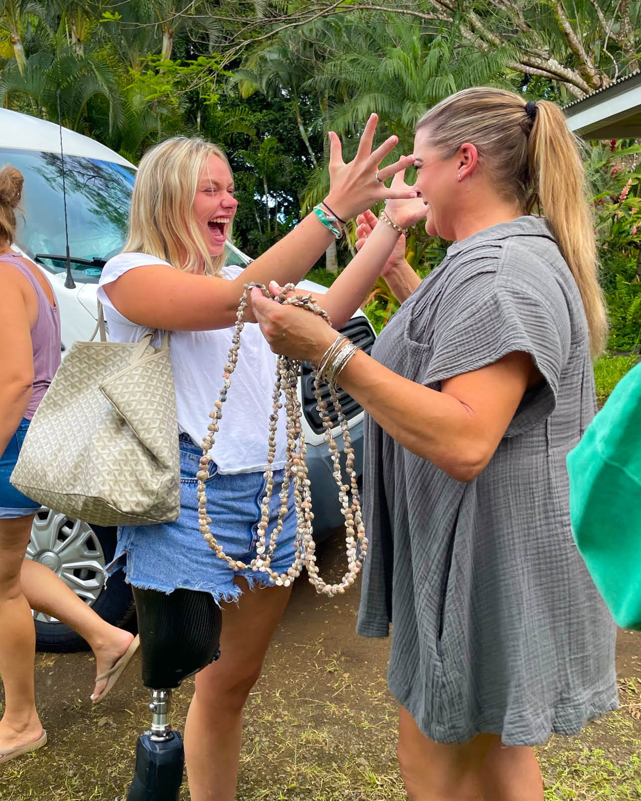 Retreat attendee Nan greeting Sarah at the beginning of the retreat