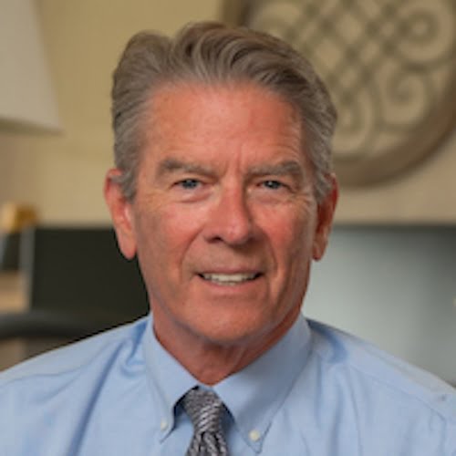 Professional headshot of James Robeson, board member for the Beautifully Flawed Foundation.