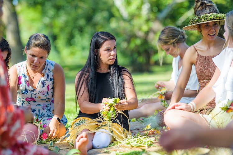 Beautifully Flawed attendee Jessica Wilson learning how to make a haku lei in Kauai.