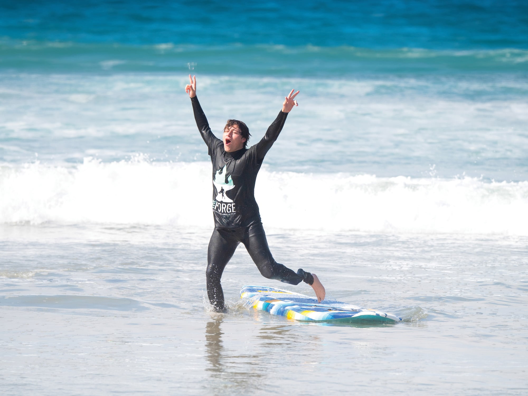 Forge retreat attendee surfing