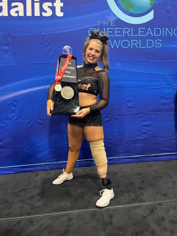 Brooke Walker holding trophy